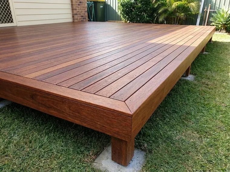 A spotted gum timber deck with a mitred picture frame edge